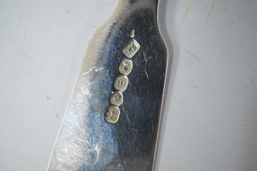 A set of four George IV silver fiddle pattern table spoons by Jonathan Hayne, London, 1827, 22.7cm, all with engraved initial, 9.5oz. Condition - fair to good